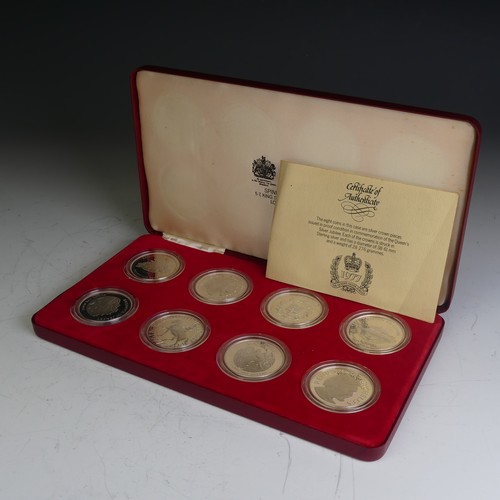 328 - A 1977 Queen Elizabeth II Silver Jubilee commemorative set of eight silver proof Crowns, in Spink &a... 