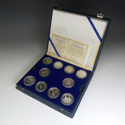 332 - A cased sterling silver 1974 Coinage of Belize eight Coin Set, issued by The franklin Mint, with cer... 