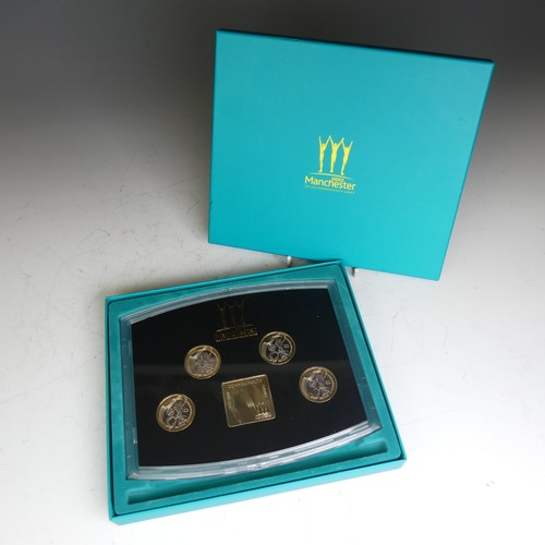 348 - A Royal Mint 2002 Manchester Commonwealth Games Commemorative Coin Set, with four proof £2 Coi... 