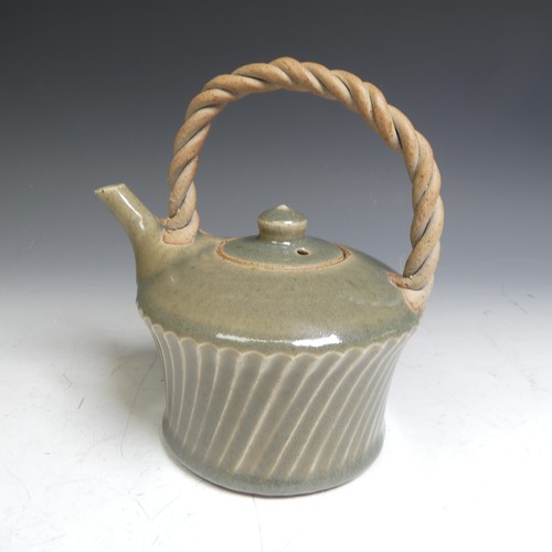 22 - A Shepherds Well, Eeles family studio pottery Teapot, of celadon glaze with twisted handle, together... 