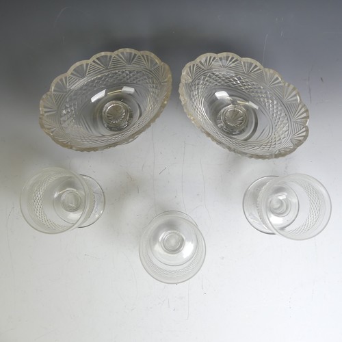 61 - A matched set of three antique moulded glass Rummers, H 13cm, together with a pair of cut glass nave... 