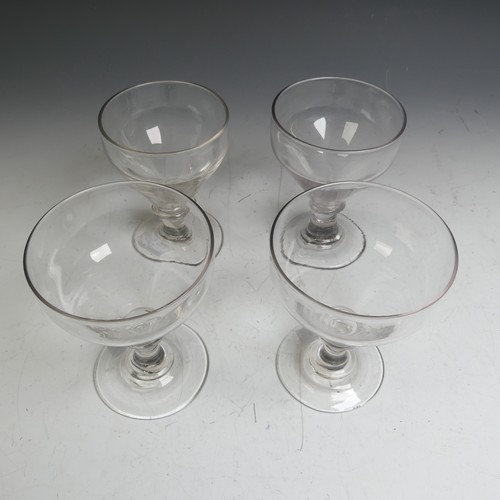 63 - A matched set of four Georgian glass Rummers, with knopped stem, somewhat varying in terms of bowl s... 