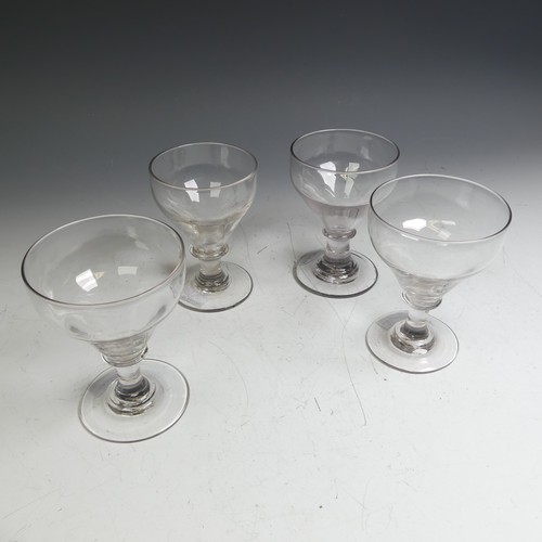 63 - A matched set of four Georgian glass Rummers, with knopped stem, somewhat varying in terms of bowl s... 