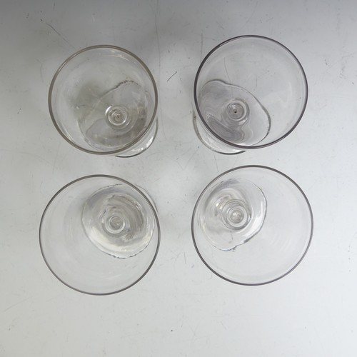 63 - A matched set of four Georgian glass Rummers, with knopped stem, somewhat varying in terms of bowl s... 