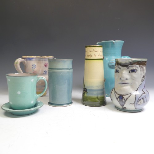 66 - Honiton Pottery; Collard, a Character Jug, possibly a 'Toby Jug', depicted in a jacket and tie with ... 