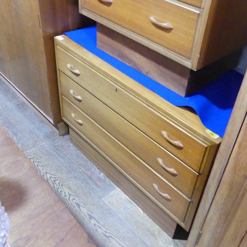 587 - A pair of Retro bedside Chest of Drawers/Cabinets, both with three drawers on raised bases, (Larger)... 