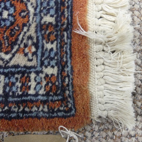 605 - Tribal Rugs; a Persian Qashqai Rug, light brown ground, wool pile on cotton base, 184cm x 130cm.... 