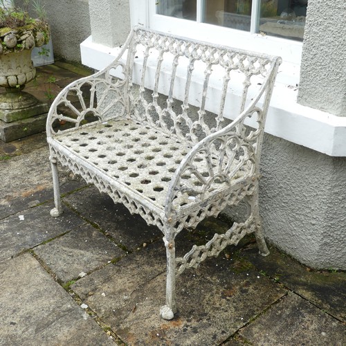 619 - A Georgian style painted metal garden Seat, the back and arm panels with Gothic style open work trac... 