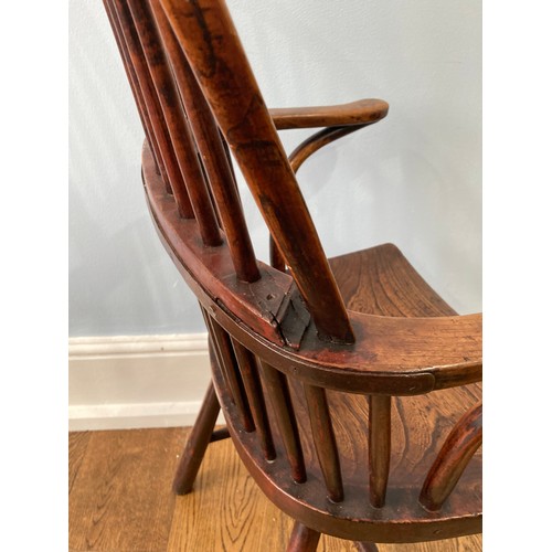 524 - A 19thC Country ash and elm hoopback windsor Armchair, with a spindle filled back above a shaped sad... 