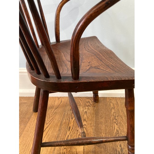 524 - A 19thC Country ash and elm hoopback windsor Armchair, with a spindle filled back above a shaped sad... 