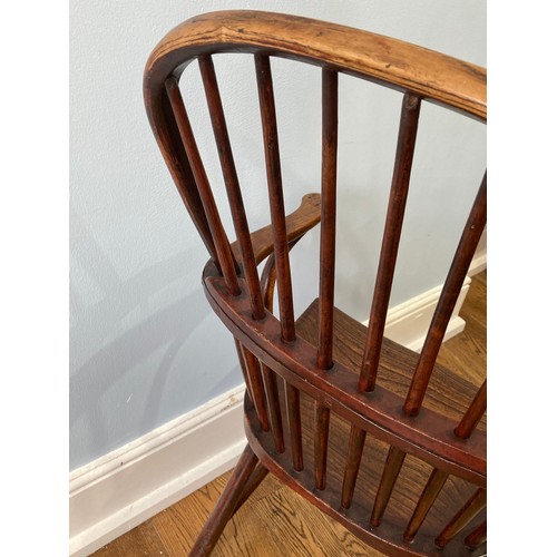 524 - A 19thC Country ash and elm hoopback windsor Armchair, with a spindle filled back above a shaped sad... 