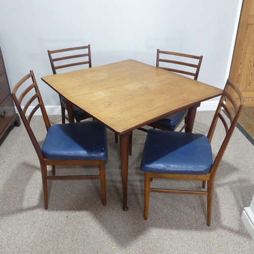 594 - A mid-20thC Meredew teak extending Dining Table, W 102.5 cm x H 85.5 cm x D 42 cm, together with a s... 