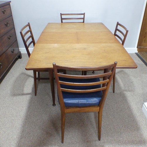 594 - A mid-20thC Meredew teak extending Dining Table, W 102.5 cm x H 85.5 cm x D 42 cm, together with a s... 