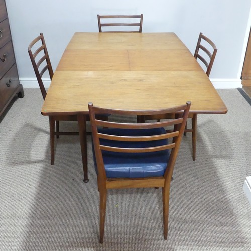 594 - A mid-20thC Meredew teak extending Dining Table, W 102.5 cm x H 85.5 cm x D 42 cm, together with a s... 