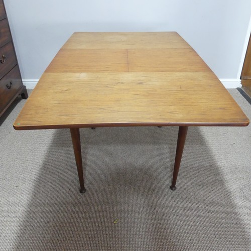 594 - A mid-20thC Meredew teak extending Dining Table, W 102.5 cm x H 85.5 cm x D 42 cm, together with a s... 