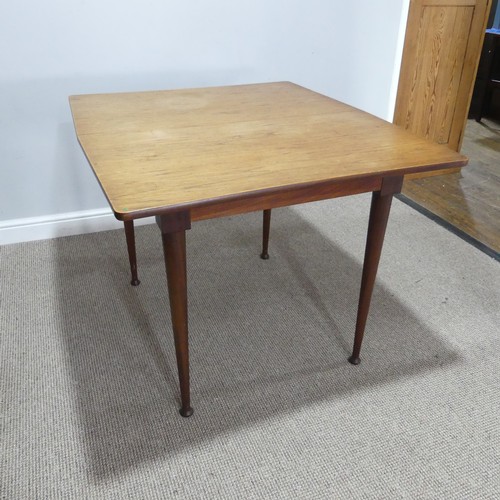 594 - A mid-20thC Meredew teak extending Dining Table, W 102.5 cm x H 85.5 cm x D 42 cm, together with a s... 