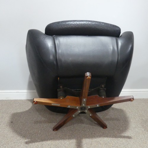 597 - A 1960s Parker Knoll 'Statesman' swivel/recline Chair, in black vinyl, W 82 cm x H 95 cm x D 80cm... 