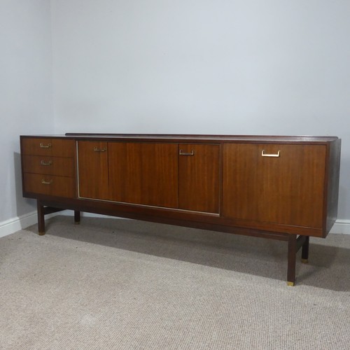 598 - A 1960's G-Plan teak Sideboard by E Gomme, central cupboard with folding doors, drop down front and ... 