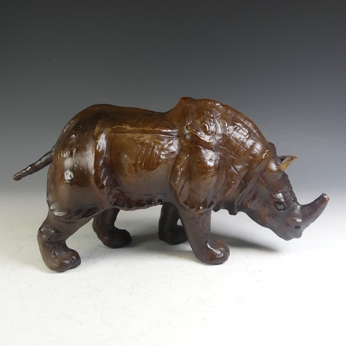 576 - An Abercrombie & Fitch style leather model of a Rhinoceros, affectionately known by the vendor a... 