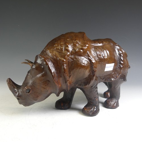 576 - An Abercrombie & Fitch style leather model of a Rhinoceros, affectionately known by the vendor a... 