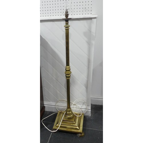 579 - An Antique brass standard Lamp, on square base, H 130 cm.