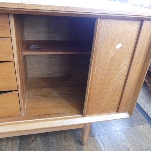 599 - A Mid-20thC teak Austinsuite tambour front Sideboard, of large proportions, W 213.5 cm x H 80 cm x D... 