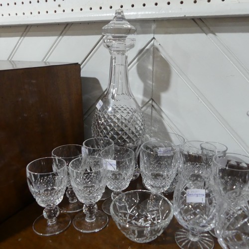 47 - A quantity of Waterford Crystal, to comprise two Decanters, twelve Wine Glasses, eleven Dessert Wine... 