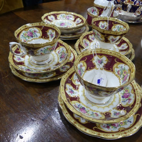 20 - A Royal Albert 'Lady Hamilton' pattern part Tea Service, to comprise four Teacups, one with hairline... 