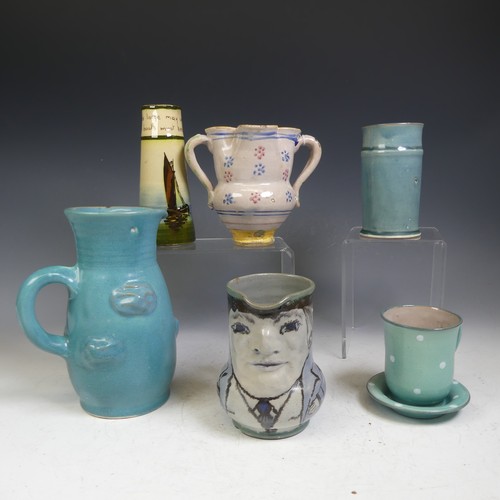 66 - Honiton Pottery; Collard, a Character Jug, possibly a 'Toby Jug', depicted in a jacket and tie with ... 