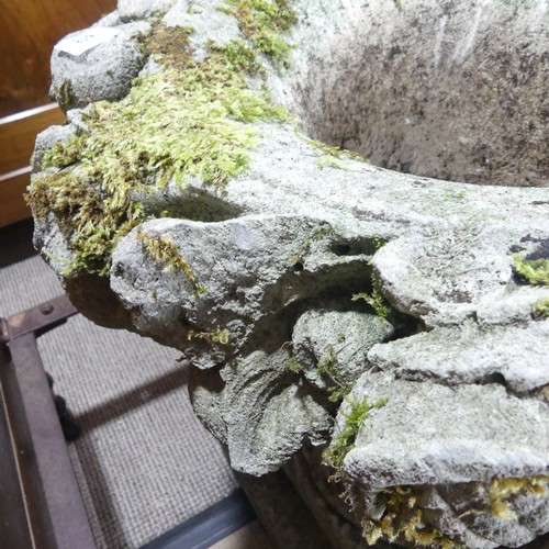 618 - A Pair of weathered stoneware garden Urns, with moulded floral borders, raised on plinth base, W 58 ... 