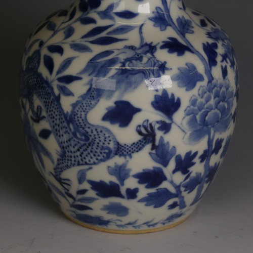 85 - A Chinese blue and white Bottle Vase, with four character mark to base, chrysanthemum and dragon pat... 