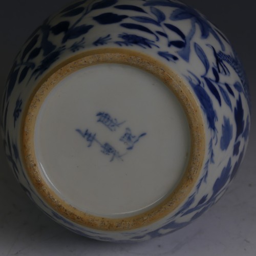 85 - A Chinese blue and white Bottle Vase, with four character mark to base, chrysanthemum and dragon pat... 