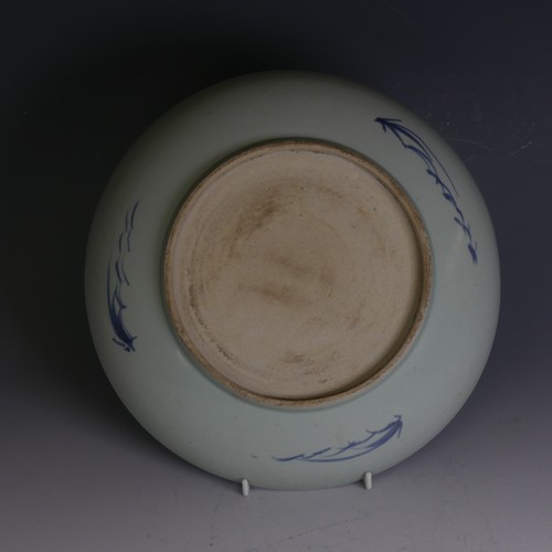 87 - A Chinese blue and white Charger, with underglaze decoration of pheonix and chrysanthemum some decor... 