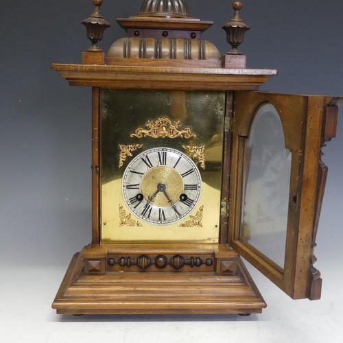 226 - A 19thC German mahogany mantle Clock, textured brass dial with Roman chapter and decorative spandrel... 