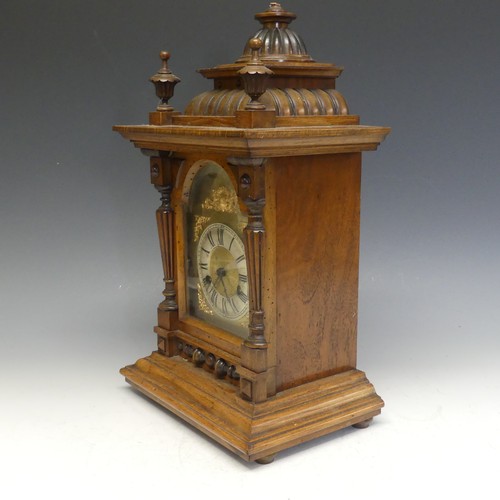 226 - A 19thC German mahogany mantle Clock, textured brass dial with Roman chapter and decorative spandrel... 