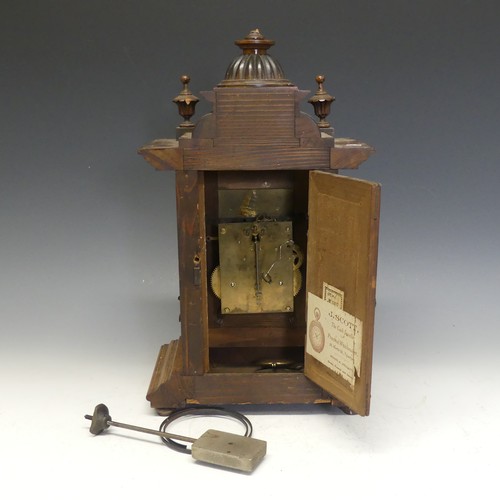 226 - A 19thC German mahogany mantle Clock, textured brass dial with Roman chapter and decorative spandrel... 