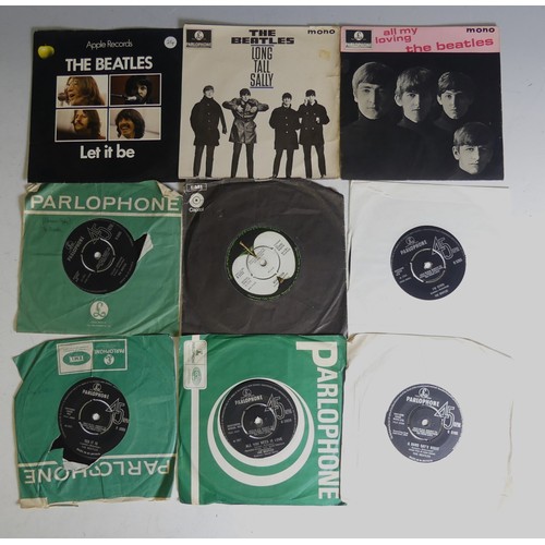 598 - Vinyl Records; The Beatles - A collection of 7