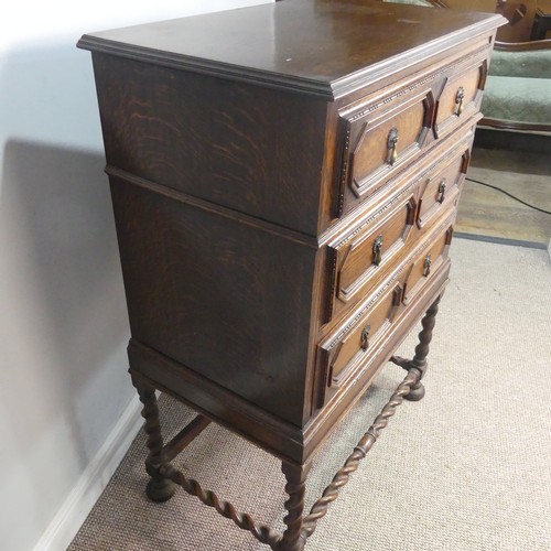 A Carolean style Early 20th century oak Chest on stand, three long ...