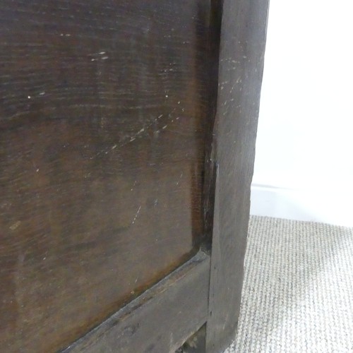 384 - An 18thC panelled oak Coffer, raised on square feet, W 109 cm x H 66 cm x D 56 cm.