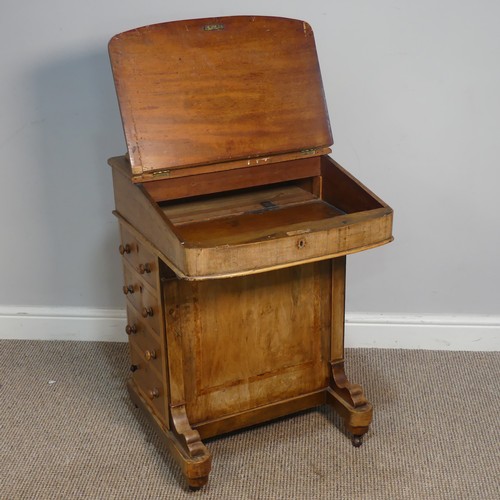 387 - A Victorian inlaid slopefront walnut Davenport, with writing skiver, above four drawers and four dum... 