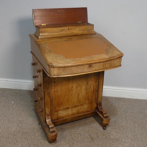 387 - A Victorian inlaid slopefront walnut Davenport, with writing skiver, above four drawers and four dum... 