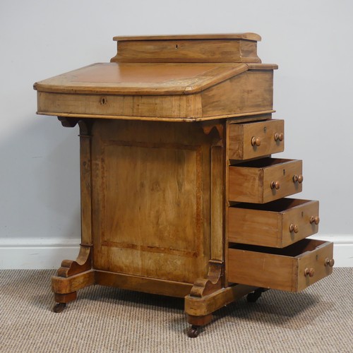 387 - A Victorian inlaid slopefront walnut Davenport, with writing skiver, above four drawers and four dum... 