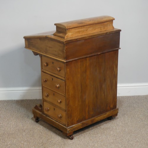 387 - A Victorian inlaid slopefront walnut Davenport, with writing skiver, above four drawers and four dum... 