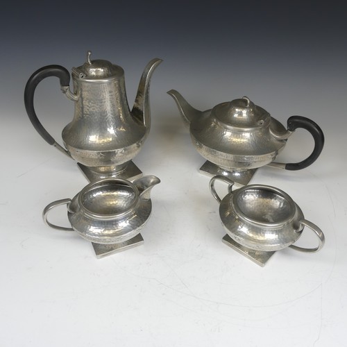 388 - An Art Nouveau hammered four piece pewter Tea set, stamped to base(4)