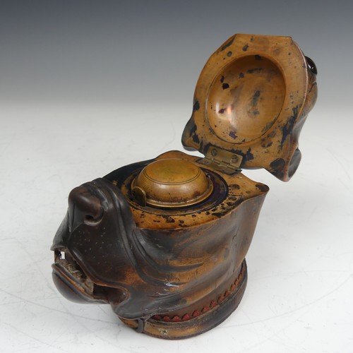 391 - A late Victorian novelty treen Inkwell, modelled as a boxer dog head, with glass eyes and leather co... 