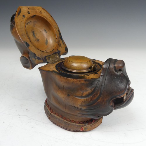 391 - A late Victorian novelty treen Inkwell, modelled as a boxer dog head, with glass eyes and leather co... 