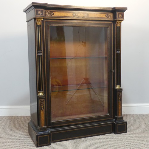 393 - A pair of 19th century gilt mounted ebonised Pier Cabinets, each with an oversailing rectangular top... 