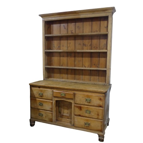 395 - An Antique pine Dresser, moulded cornice above three shelves with hooks, raised on dresser base with... 