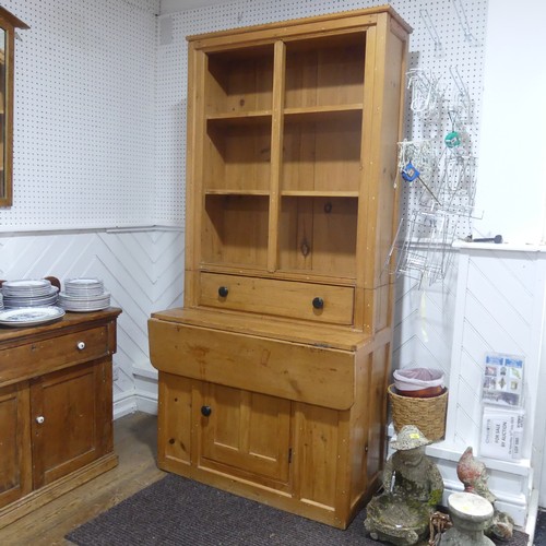 398 - A late 19th century Canadian pine kitchen Dresser, Nova Scotia, with hinged serving flap and open sh... 