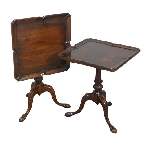 403 - A Pair of reproduction mahogany tripod wine Tables, the square tilt-tops with moulded borders, raise... 